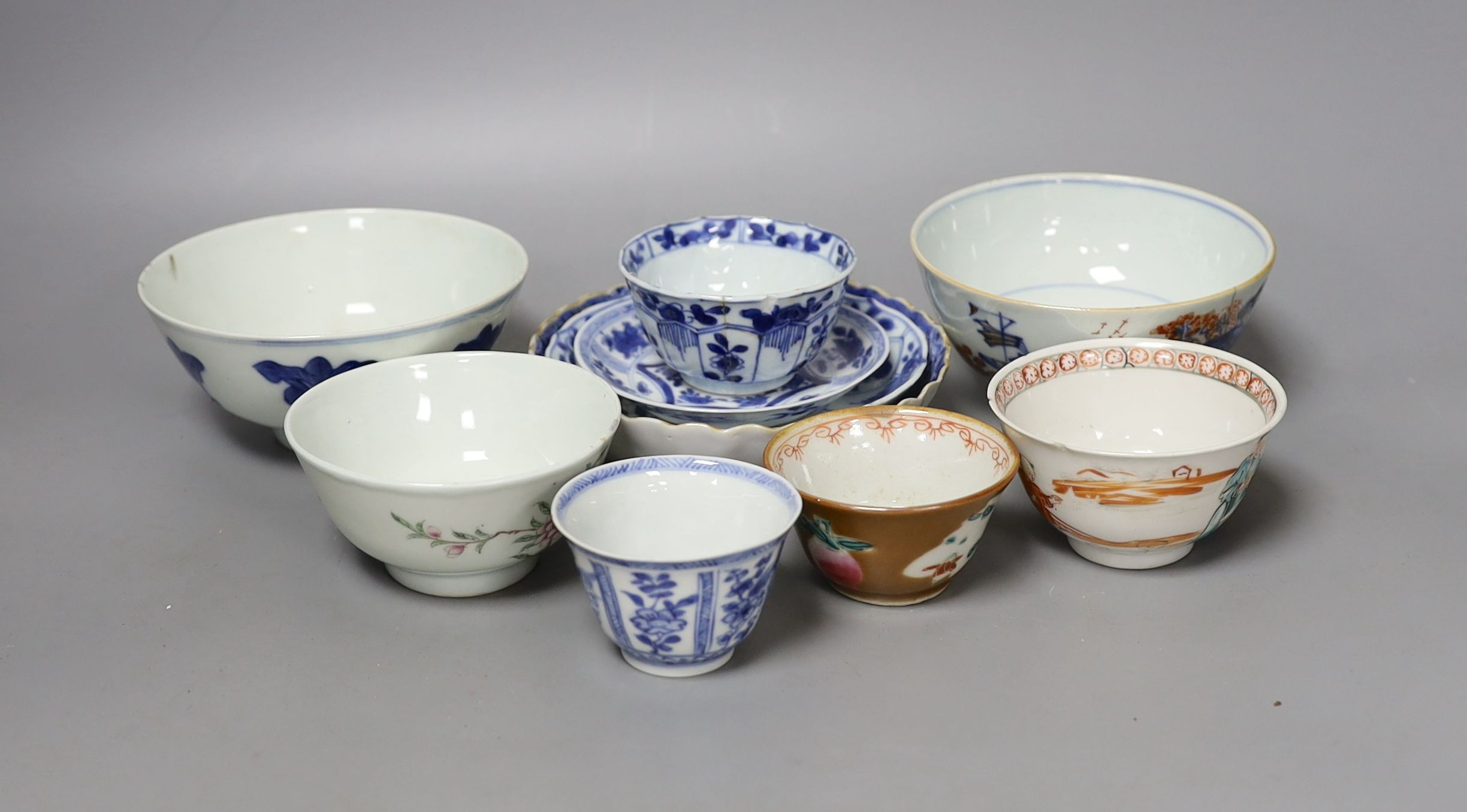 A collection of seven various 18th century and later Chinese tea and rice bowls and two saucers, a single large saucer (10)